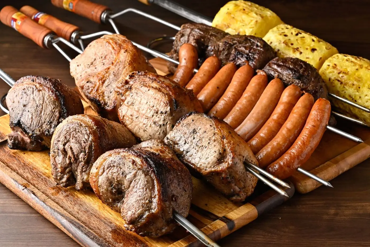 Churrasco skewers on a wooden board